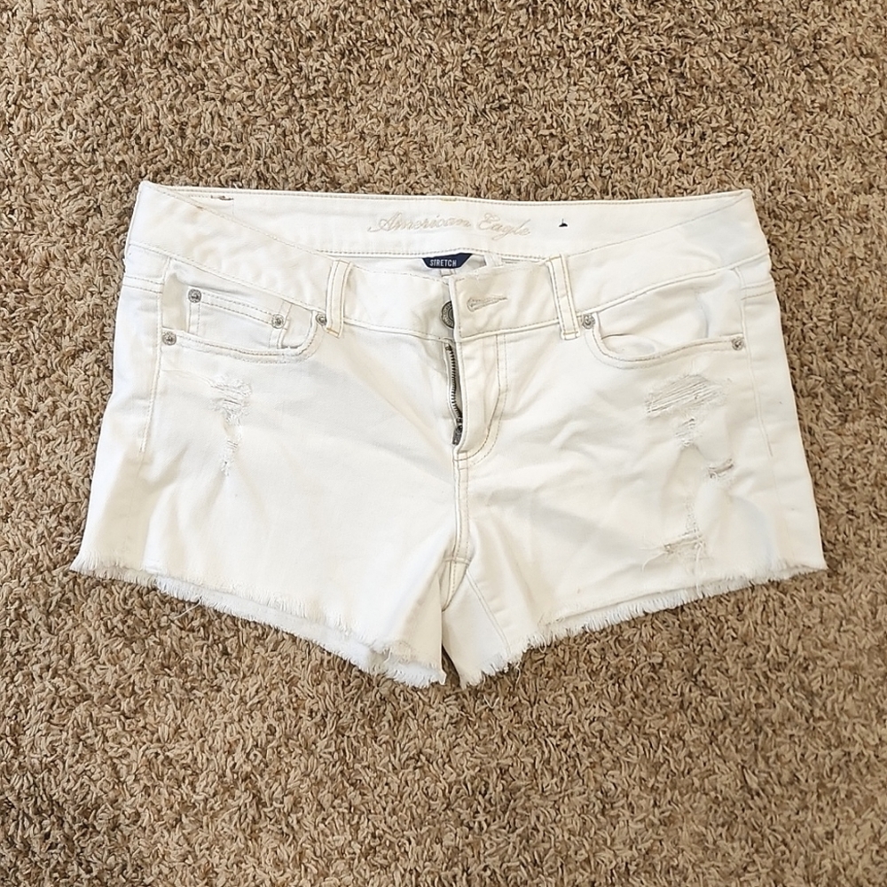 Size 10, American Eagle white denim shorts, distressed, stretch